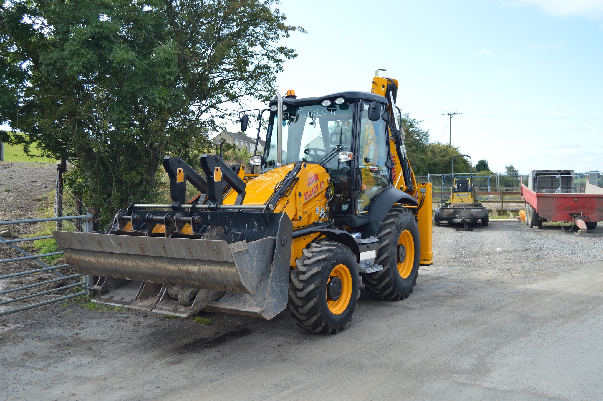JCB backhoe loader in the John Elliot yard
