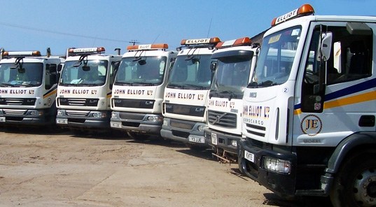 A line of white wagons in John Elliot Ltd livery